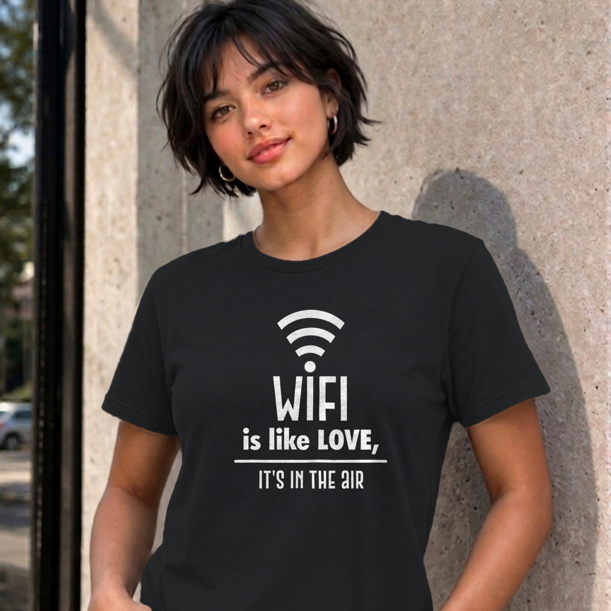 Woman wearing the black Wifi Is Like Love graphic tee
