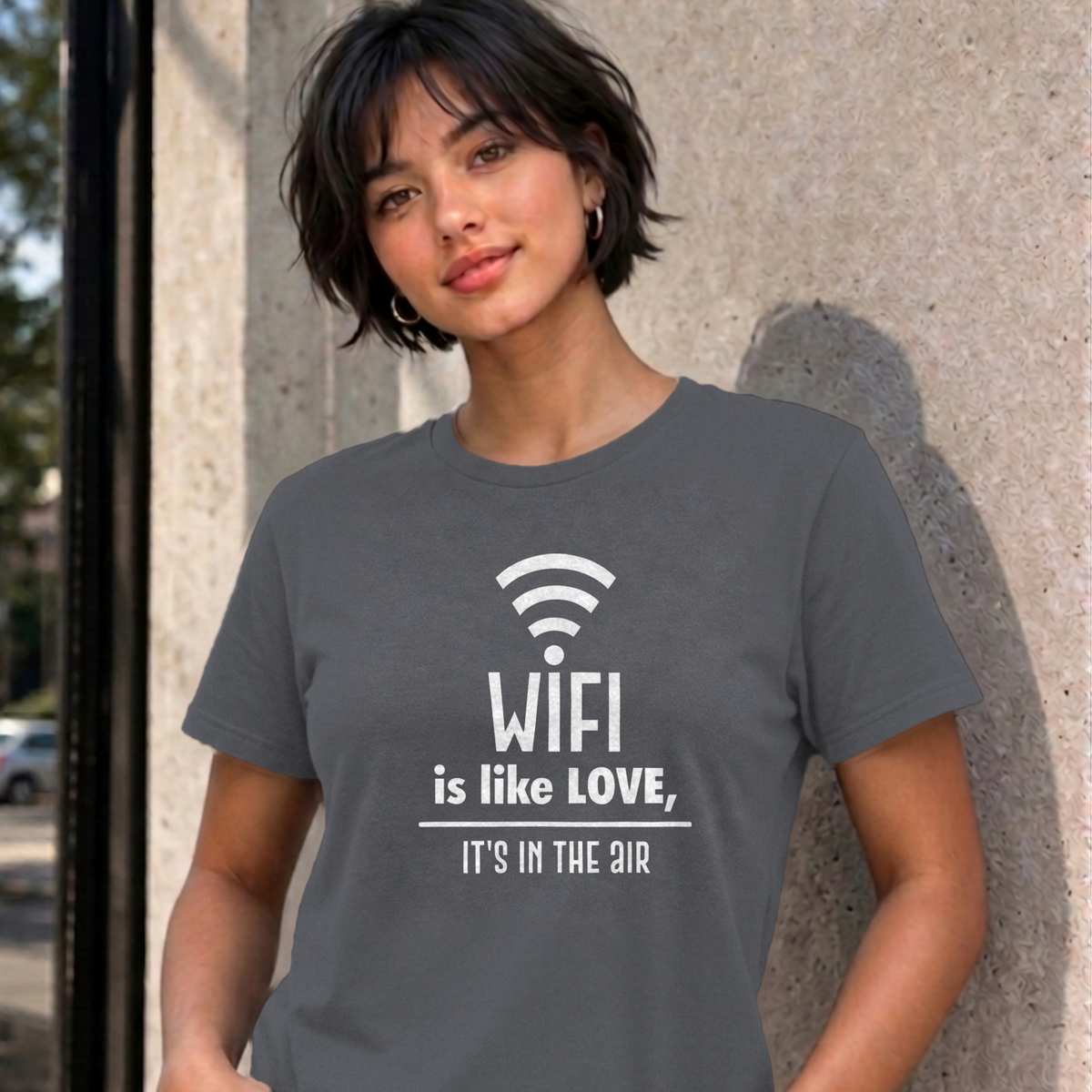 Woman wearing the charcoal Wifi Is Like Love graphic tee