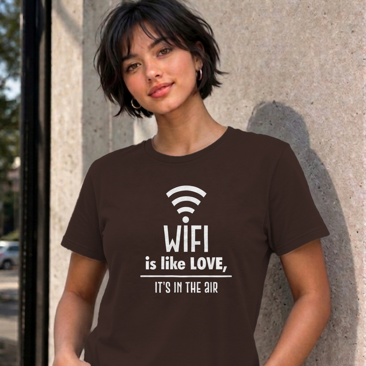 Woman wearing the dark chocolate Wifi Is Like Love graphic tee