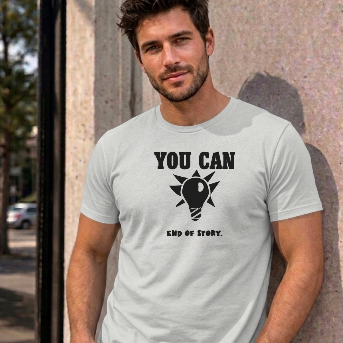 Man wearing the ash You Can Light Bulb graphic tee