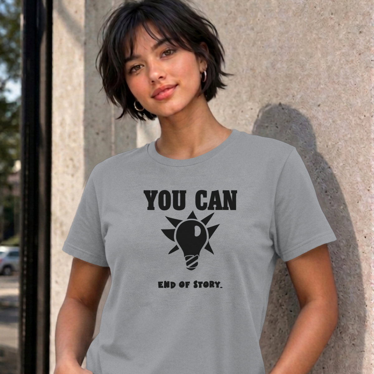 Woman wearing the sport grey You Can Light Bulb graphic tee